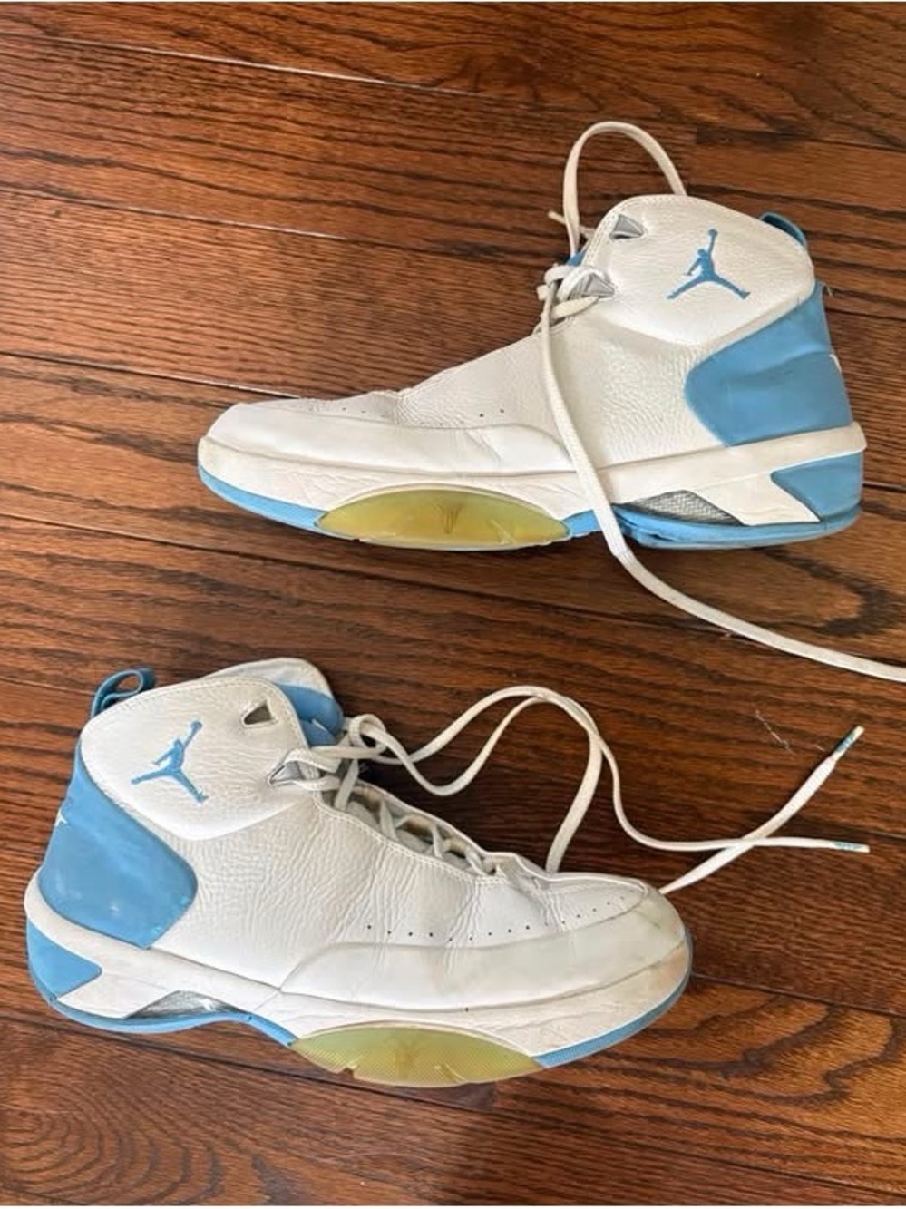 Jordan White with Light Blue High-Top Basketball Sneakers